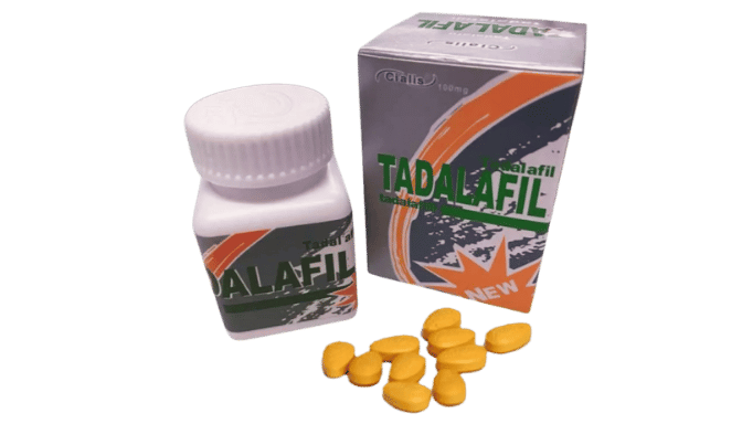Tadalafil pills in bottle and box with loose tablets. Erectile dysfunction medication.